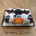 Hand painted ceramic bread plate with cow design